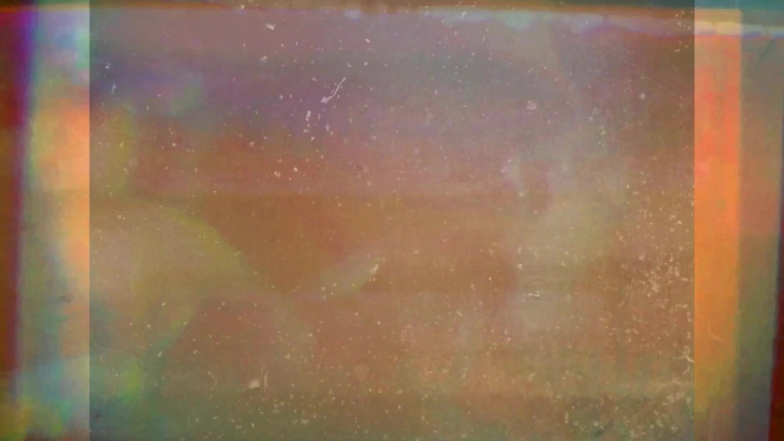 Amber and rose abstract film layers in Sol Alegria Del Mare Alias Yume Nikki.